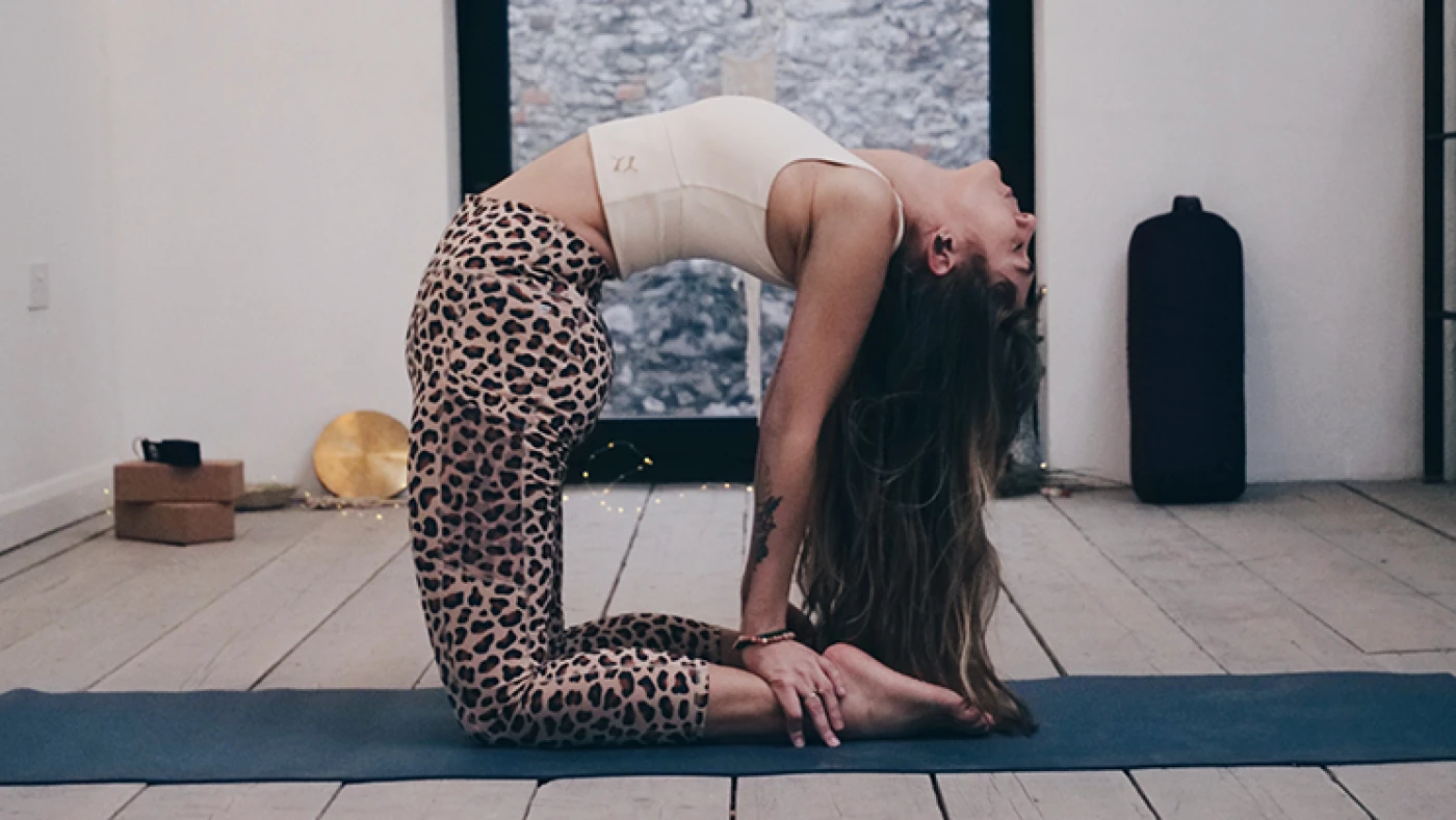 a woman in a yoga pose