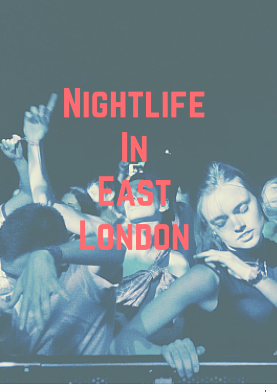 Image of a crowd of young people inside a dark club dancing.