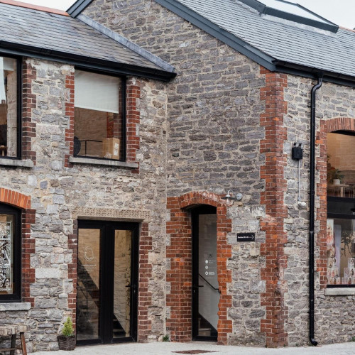 Secure bike storage area at Alma Yard, offering sustainable travel support for residents within the creative campus in Plymouth.