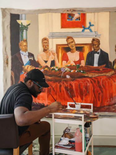 Artist in residence painting in a private studio space at Cornerstone Studios, South London