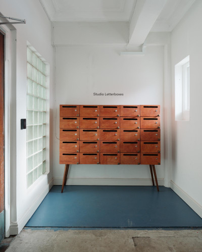 Studio letterboxes inside Light Studios Plymouth, mid-century inspired design in a bright and minimal interior