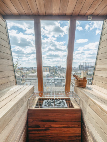Scandinavian-style rooftop sauna at Netil House with panoramic views over Hackney and East London skyline