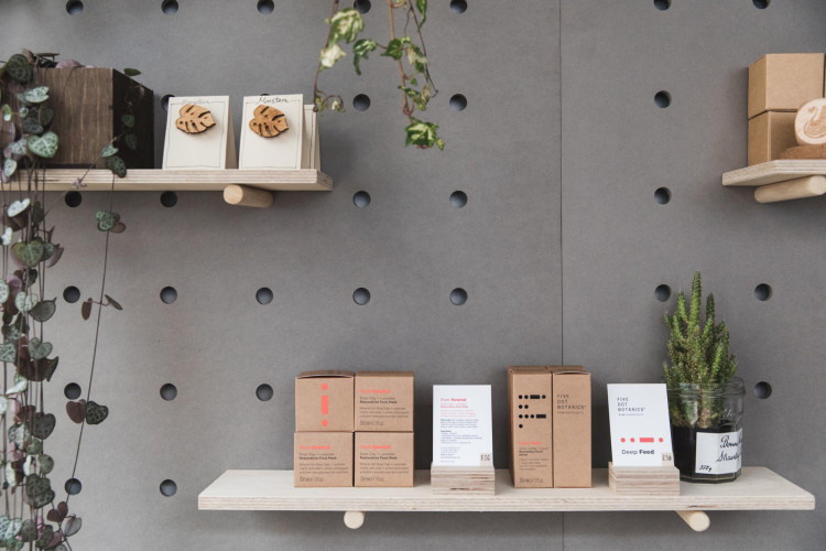 Minimal retail shelves featuring Paradox Coffee beans items at Netil Market
