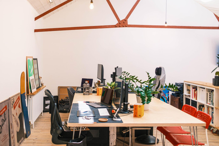 Bright and modern coworking desk space at Alma Yard for creatives and small businesses